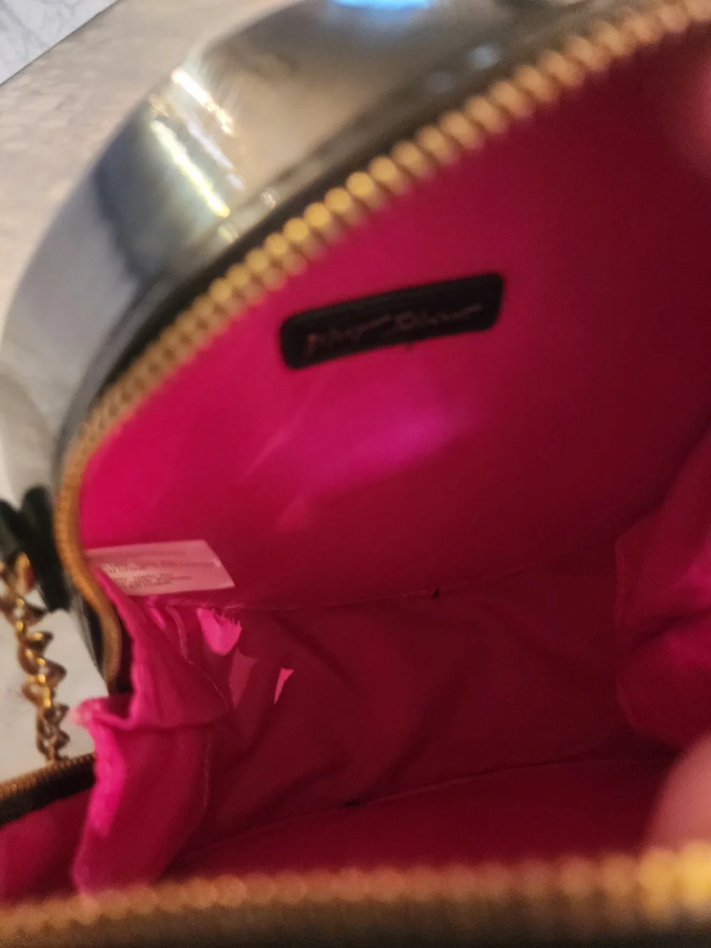 Betsey Johnson Black Oval Crossbody Bag with Gold Frame Accent